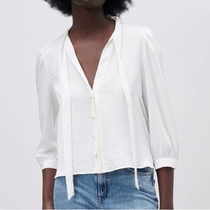 Pearl button bow Zara top